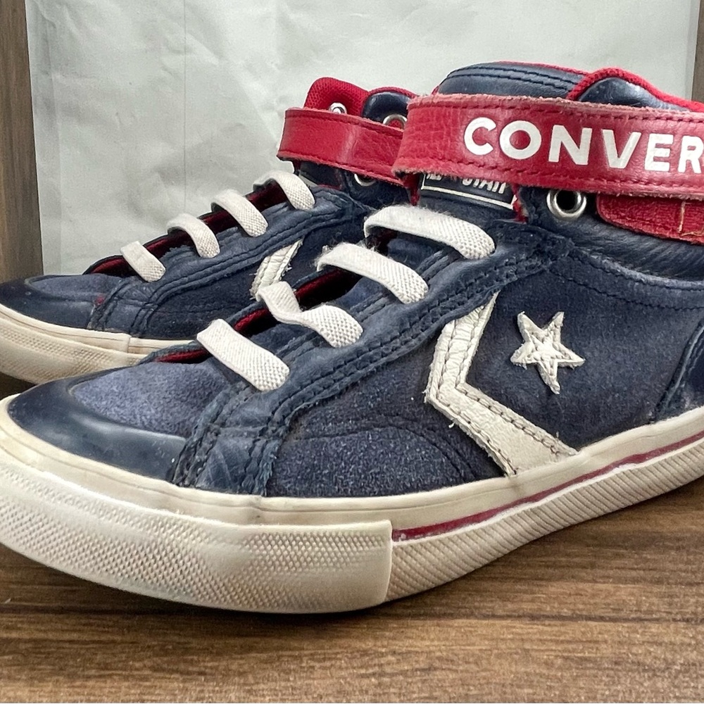 These shoes are so cool! Retro boys converse, red white and blue.